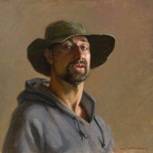 A portrait by a Duluth MN artist features a man in a wide-brimmed hat and gray hoodie. The muted brown background accentuates his thoughtful expression and rugged appearance. The painting's realistic style captures every detailed texture beautifully.