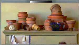 A collection of stacked and scattered terracotta pots sit on a shelf, crafted by a talented Duluth MN artist. Accompanied by a spool of twine and folded towel, a small black pot holds purple flowers, adding a touch of color to the earthy scene.