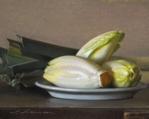 A still life painting by a Duluth MN artist showcases three heads of Belgian endive on a white plate, with a peeled leaf and green leafy vegetables in the background. The composition is set against a soft, muted backdrop, creating a classical and serene atmosphere.