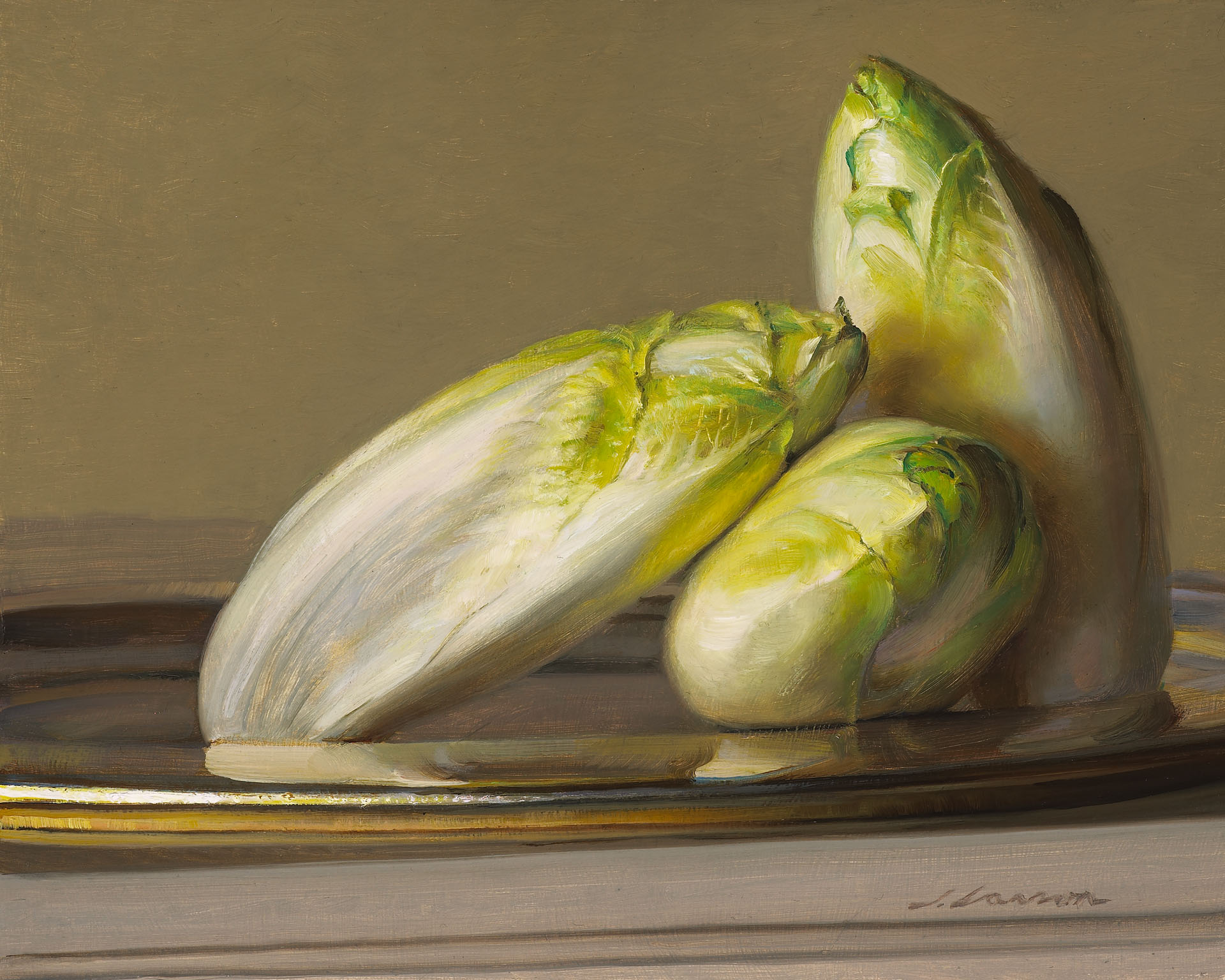 A still life by a Duluth MN artist features three heads of Belgian endive on a silver plate, set against a muted brown background. The green and white leaves exude a soft, natural sheen.