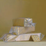 A still life painting by a Duluth MN artist captures three stacked rectangular packages wrapped in plastic, set on a yellow surface with a matching backdrop. In front of the bottom package lies a solitary cracker, adding an intriguing contrast to the composition.