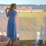In a sunlit yard, a woman in a blue dress hangs laundry on a clothesline, her work reminiscent of a Duluth MN artist capturing everyday beauty. Pastel hues dance across the sheets as shadows play. Nearby, her basket sits while the rural landscape unfolds in the background.