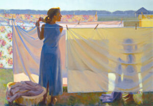 In a sunlit yard, a woman in a blue dress hangs laundry on a clothesline, her work reminiscent of a Duluth MN artist capturing everyday beauty. Pastel hues dance across the sheets as shadows play. Nearby, her basket sits while the rural landscape unfolds in the background.