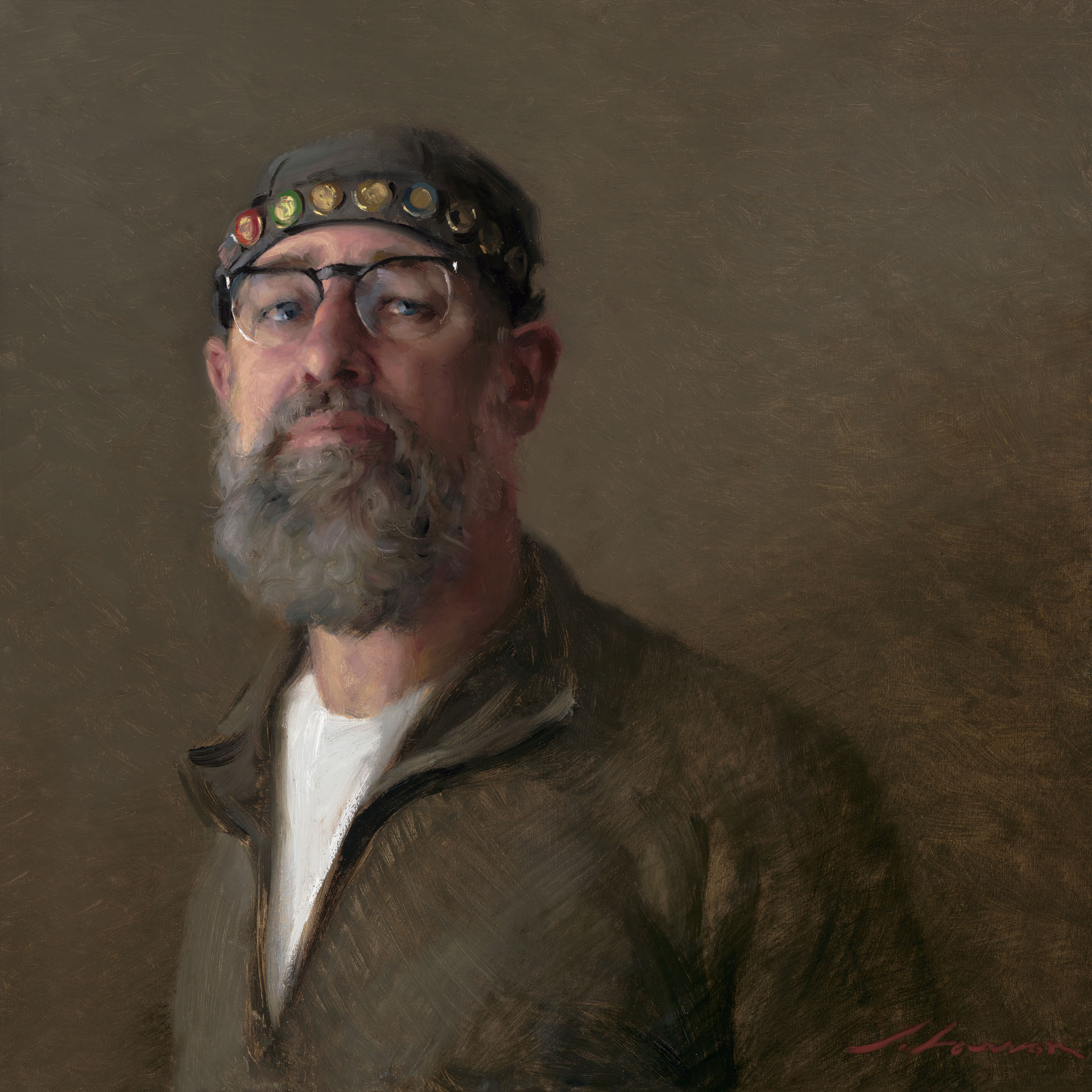 A portrait of a man with a gray beard and glasses, wearing a hat adorned with colorful buttons and a brown shirt. The background is a muted, earthy tone, giving the image a classic and painterly feel.