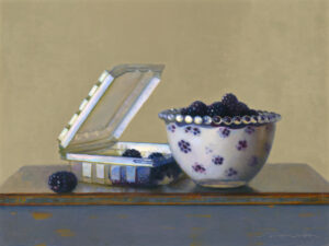 A still life painting by a Duluth MN artist features a white bowl adorned with floral patterns, brimming with blackberries. Nearby, an open plastic container spills more of the ripe fruit onto the wooden surface, all set against a plain background.