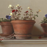 Three terracotta pots with vibrant flowers—red, yellow, and purple—adorn a ledge. A white cloth with red stripes is draped beside them. A Duluth MN artist captures this scene, using a neutral background to enhance the vibrancy of the blooms.