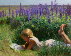 A child lies on their stomach in a field of tall purple flowers, drawing like a budding Duluth MN artist. Sunlight bathes the scene, highlighting the child's light-colored clothing and hair. The atmosphere is peaceful and summery.