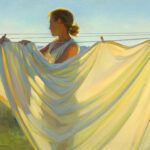 A Duluth MN artist hangs white sheets on a clothesline under a clear sky. The sunlight casts soft shadows on the fabric, highlighting the gentle folds and the serene setting. The figure's silhouette is illuminated by the warm, golden light, capturing a moment of simple artistry.
