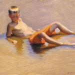 A painting by a talented Duluth MN artist captures a boy lounging in shallow water. Shirtless and wearing orange shorts, he leans back on his hands, casting a shadow on the sand. The water reflects vivid patches of light and color.