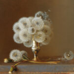 A realistic painting by a Duluth MN artist showcases dandelion seed heads in a small metallic vase on a table. A few dandelions lie beside the vase, their seeds gently floating away against a soft brown background.