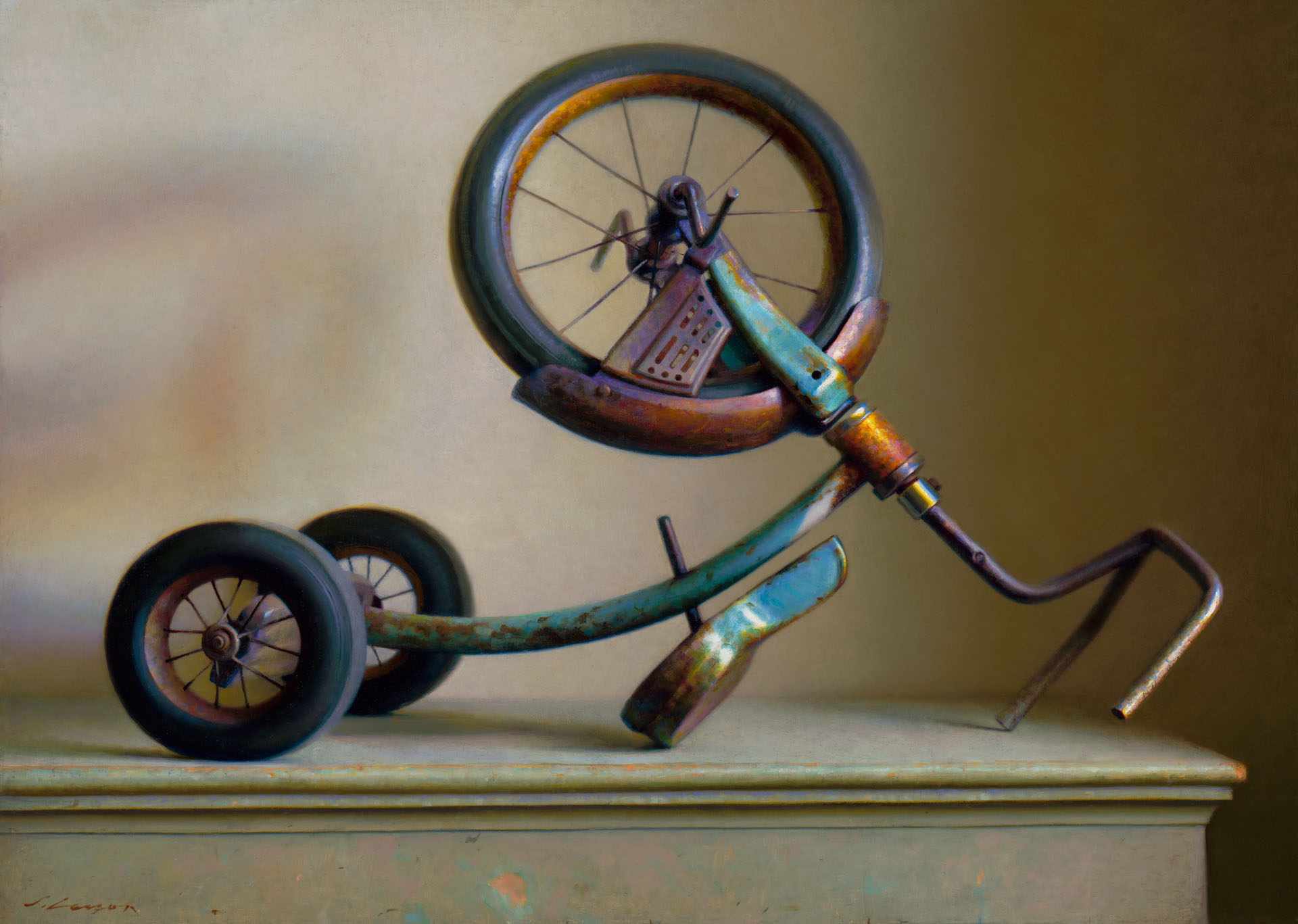 A vintage, rusted tricycle by a Duluth, MN artist is displayed upside down on a table, casting an intricate shadow on a plain background. The tricycle's worn paint and visible wear suggest age and use, with its handlebars and wheels prominently featured.