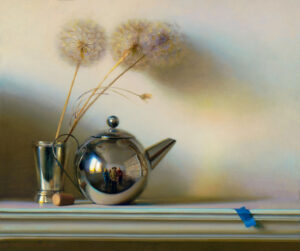 A still life by a Duluth MN artist showcases a metallic teapot and its reflection, beside a silver cup holding three dandelions. A small cork rests nearby, with a blue piece of tape at the edge against a soft, gradient background.