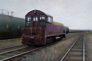 A maroon locomotive, resembling an evocative scene from a Duluth MN artist's canvas, travels along railway tracks next to a line of black tank cars. The sky is overcast, and the landscape is flat, with dry grass bordering the tracks.